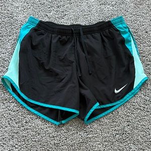 Black and teal Nike shorts size medium